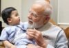जानें कौन है PM मोदी की गोद में दिख रहा मासूम बच्चा, जिसे उन्होंने बताया अपना नन्हा दोस्त? फोटो शेयर कर खुद दी जानकारी